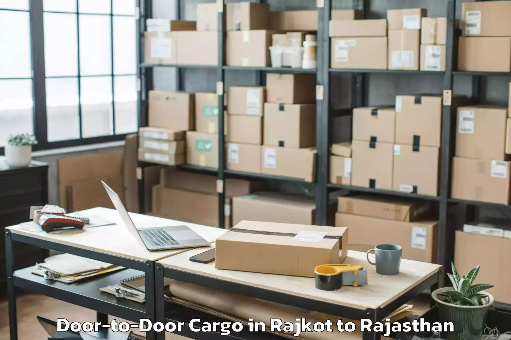 Affordable Rajkot to Reengus Door To Door Cargo